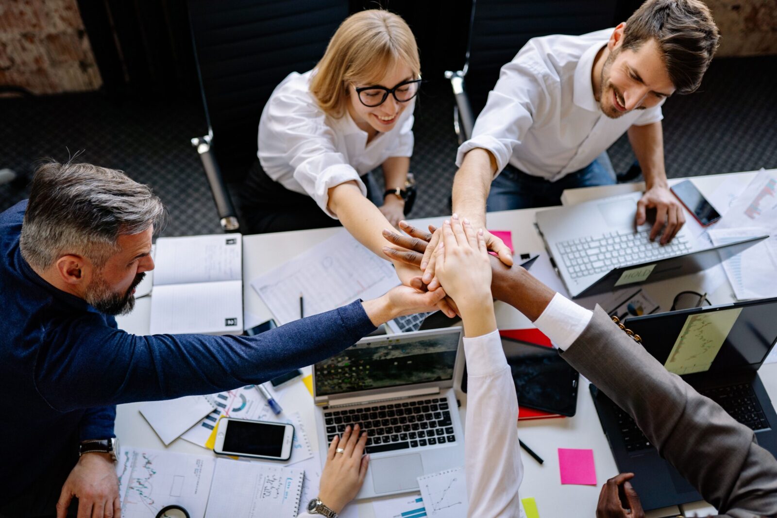Business professionals collaborating around a conference table.